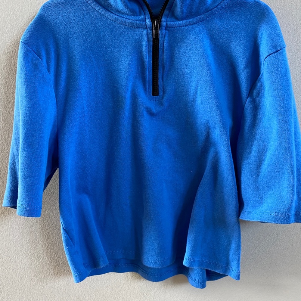 cropped blue shirt with zipper front